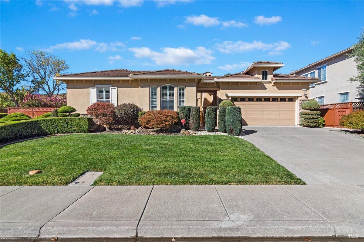 a front view of house with yard