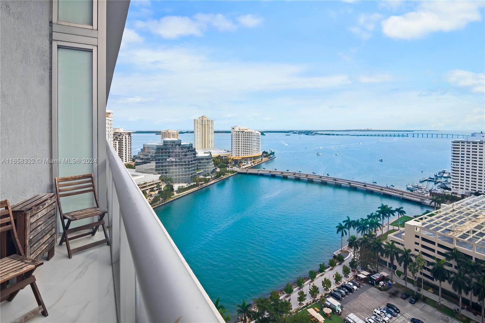 a view of a balcony with ocean view