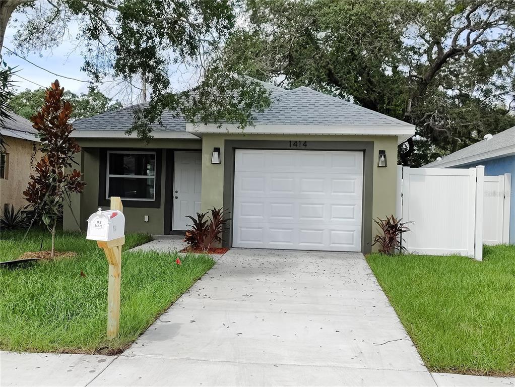 a front view of house with yard