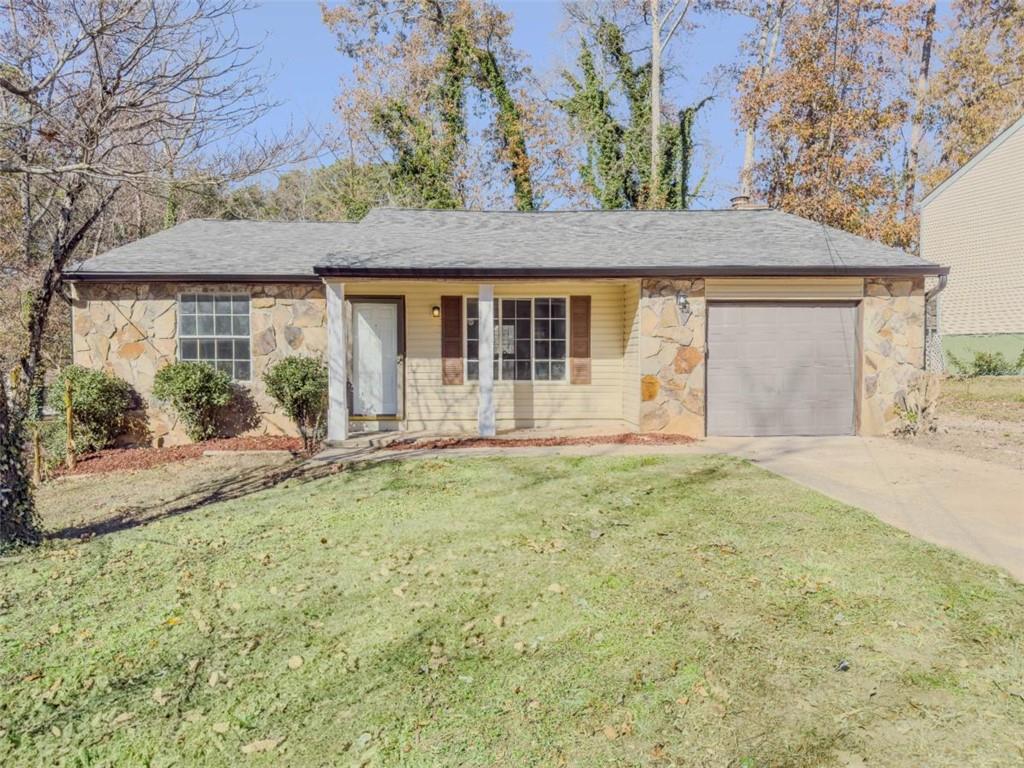 front view of house with a yard