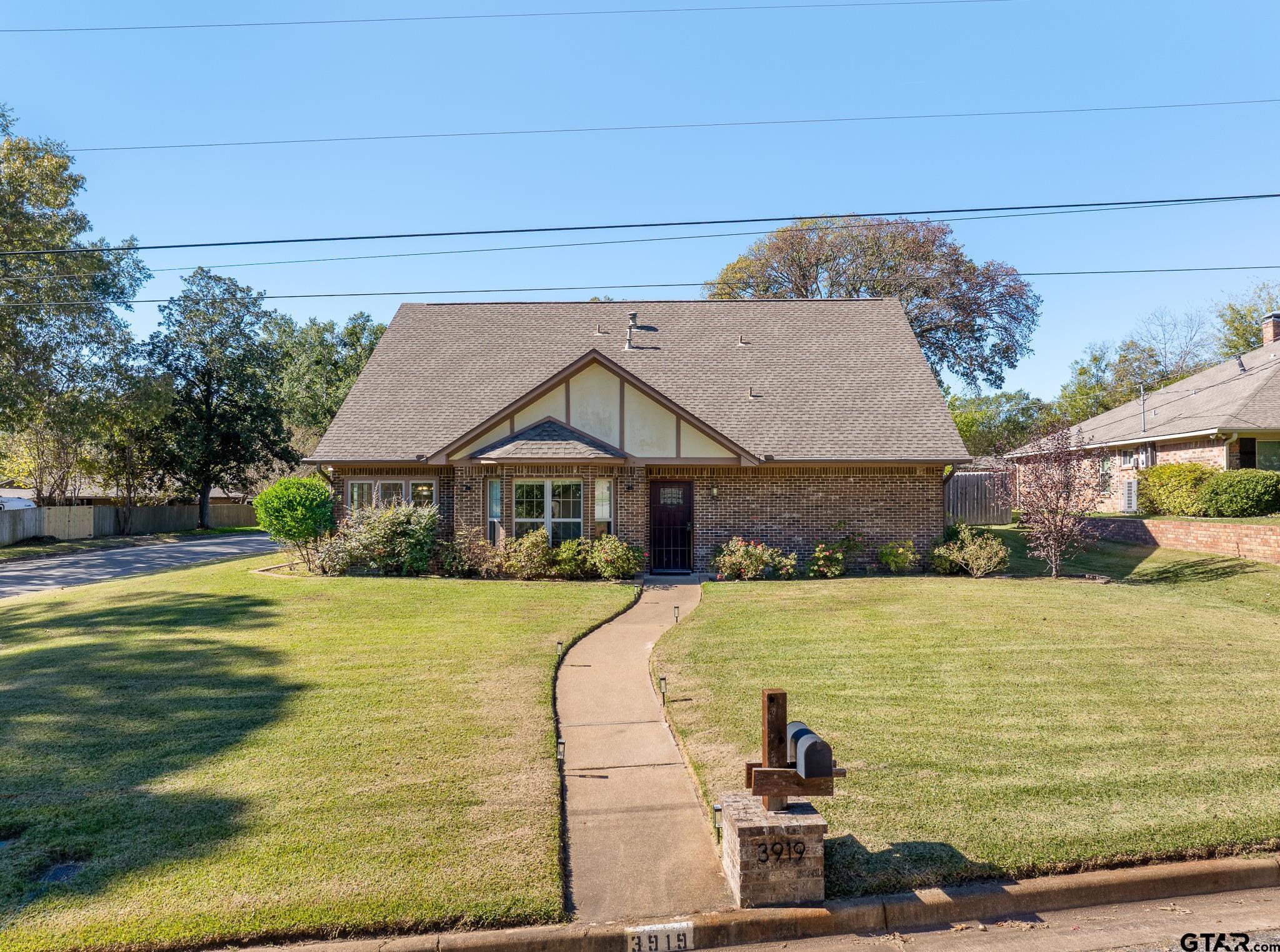 a view of a house with a swimming pool