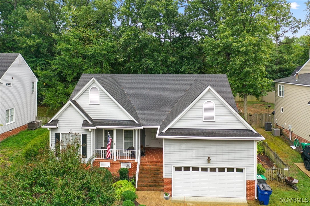 a aerial view of a house with a yard