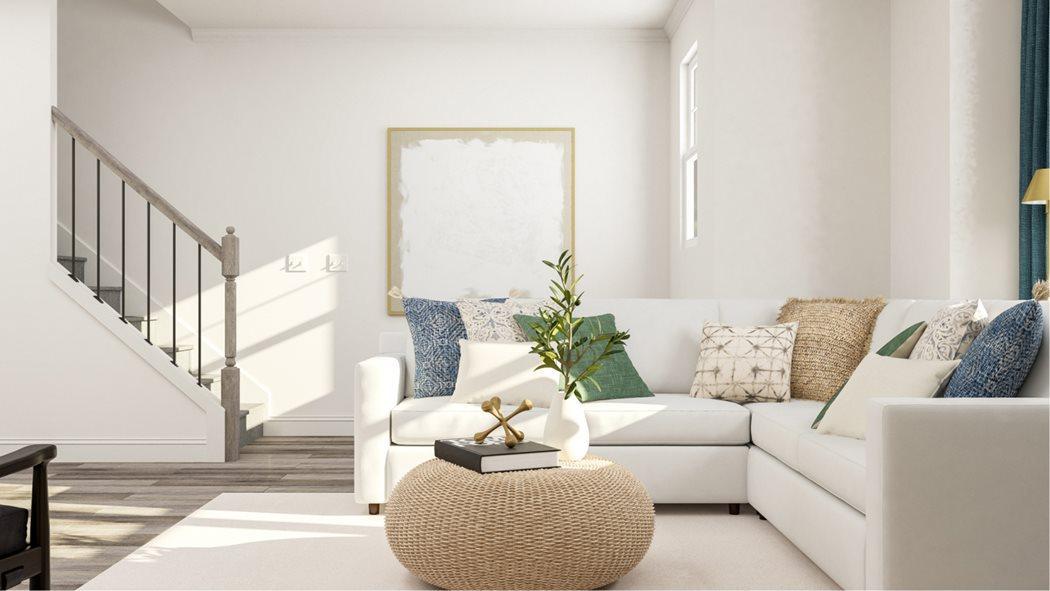 a living room with furniture and white walls