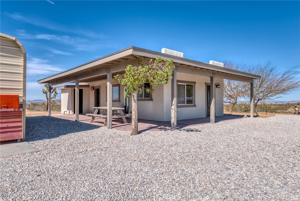 front view of a house with a patio