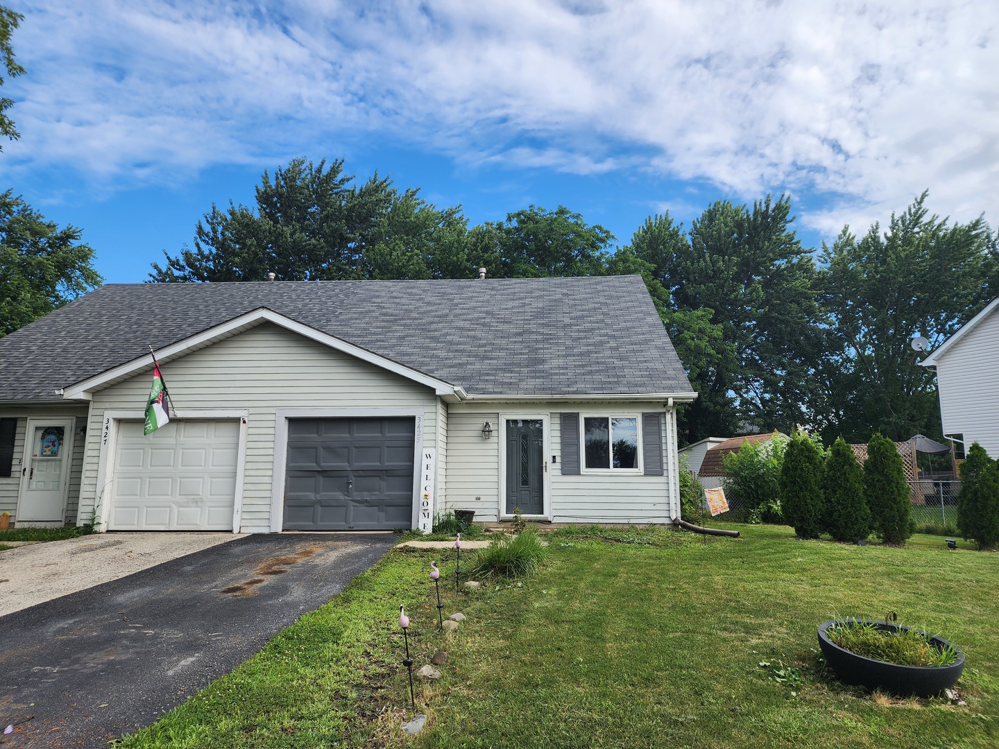 front view of a house with a yard