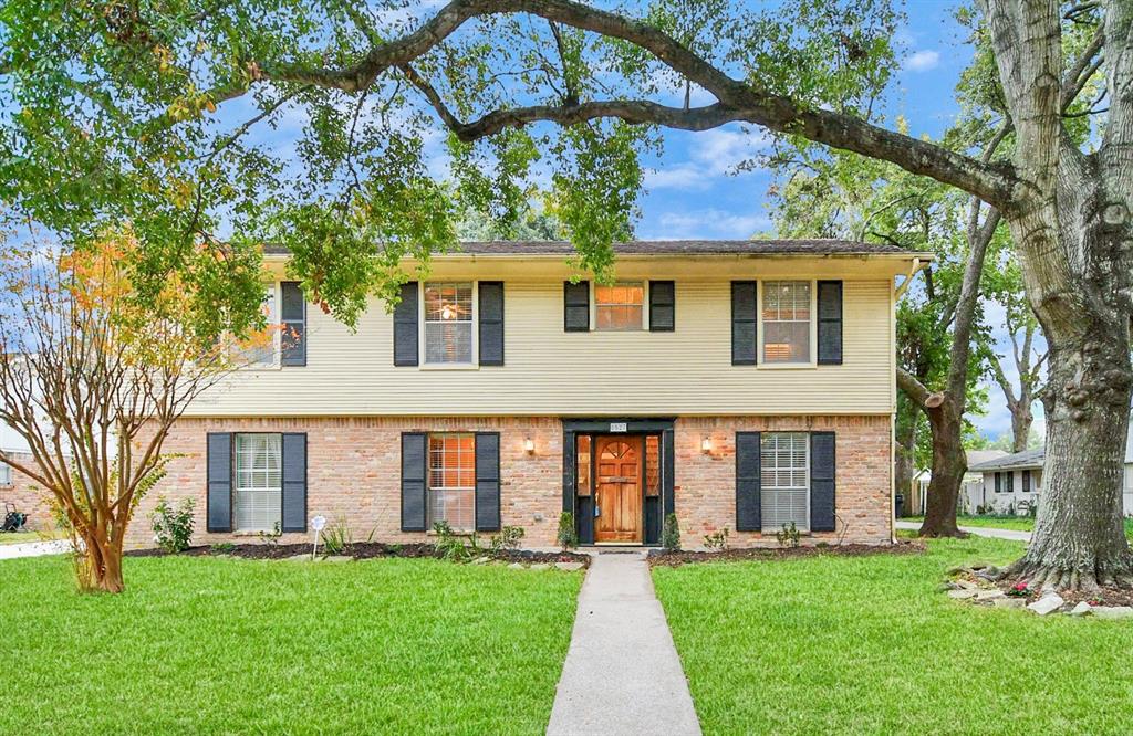 Stately two story home in the Sharpstown Country Club area! Move in ready with mature oaks and an abundance of vintage charm!