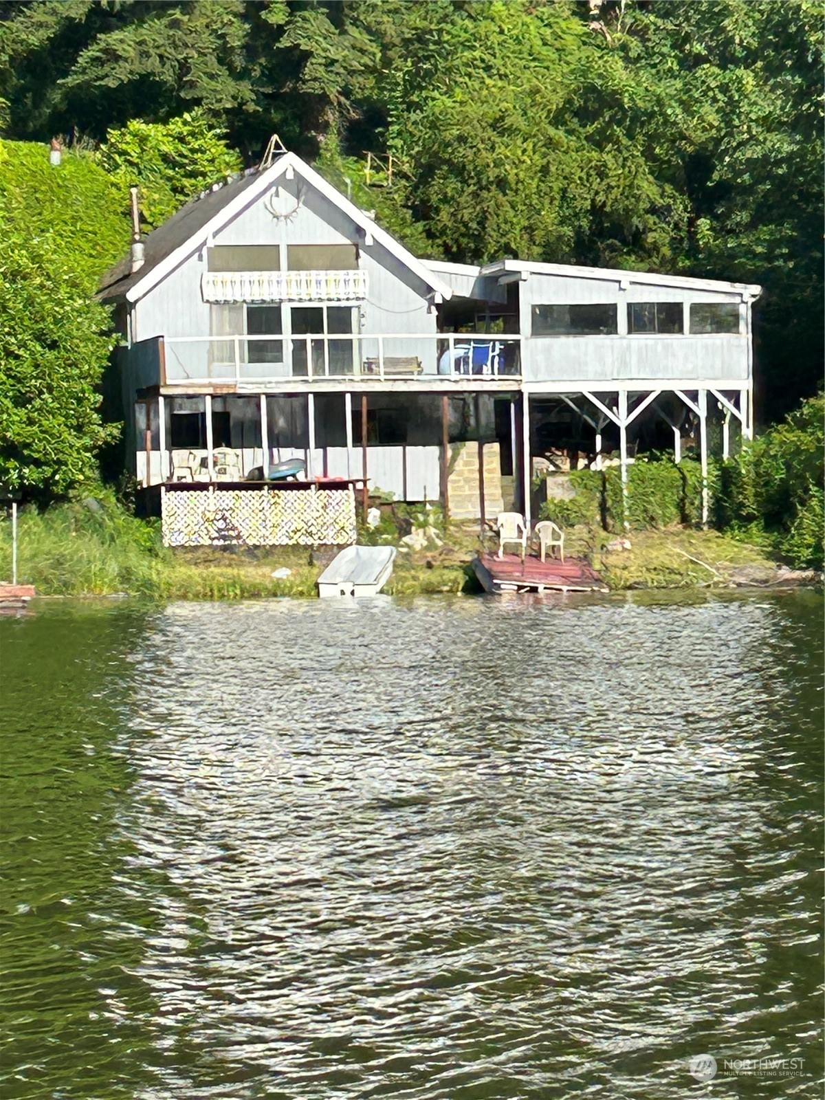 a front view of a house with swimming pool