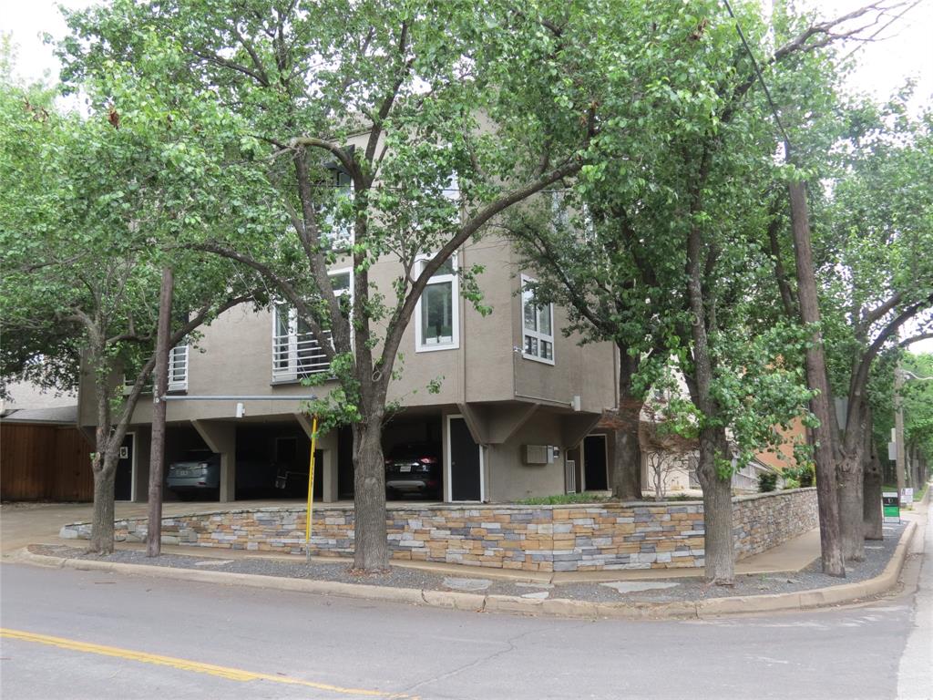 a front view of a house with street