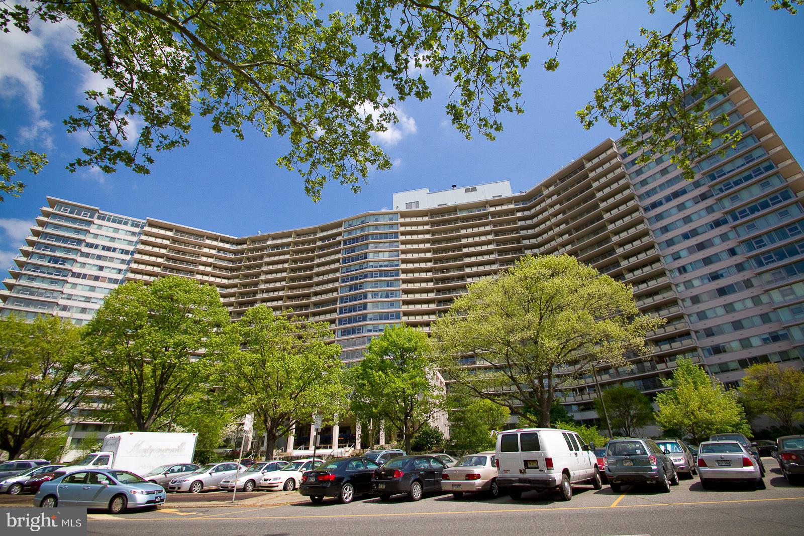 a view of a cars parked in front of a building