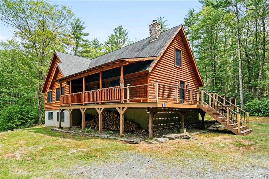 a view of house with yard