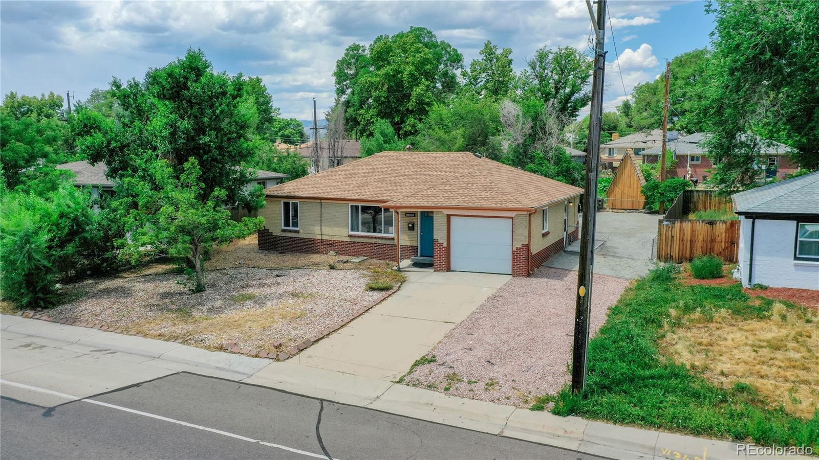 a house with yard in front of it