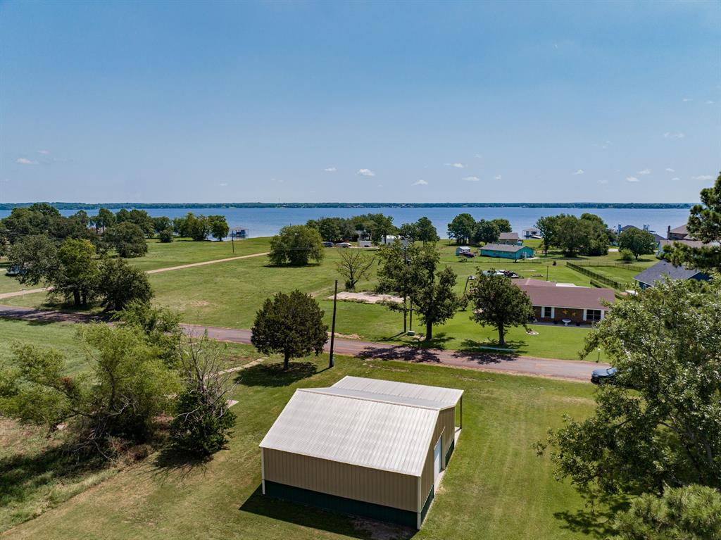 a view of a park with houses