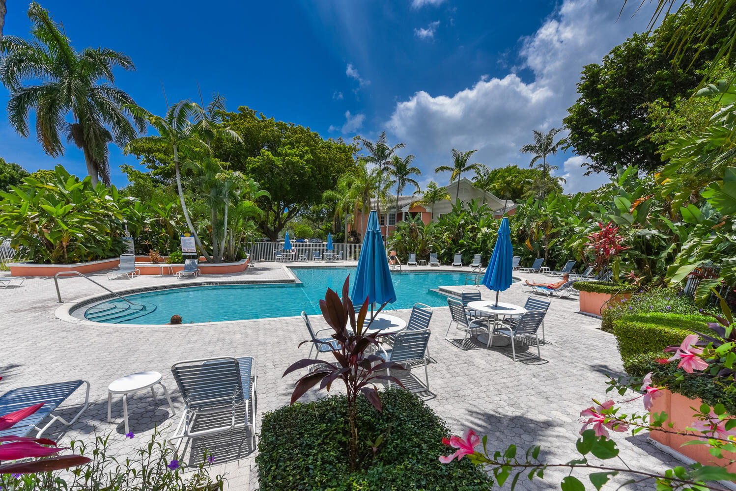 a view of a swimming pool with a patio