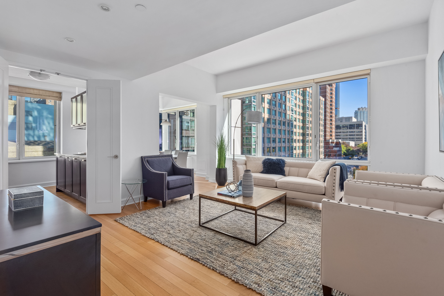 a living room with furniture and a window