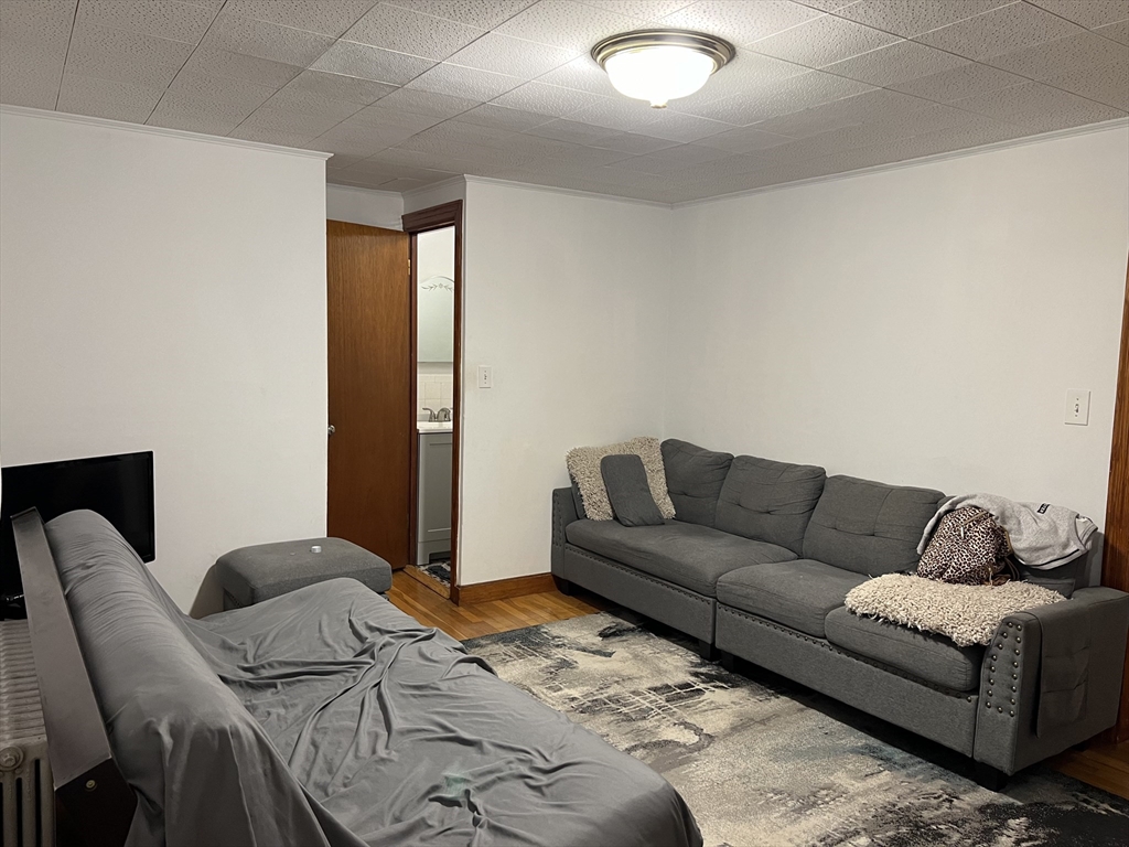 a living room with furniture and a couch