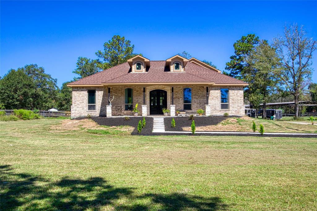 a view of a house with a swimming pool