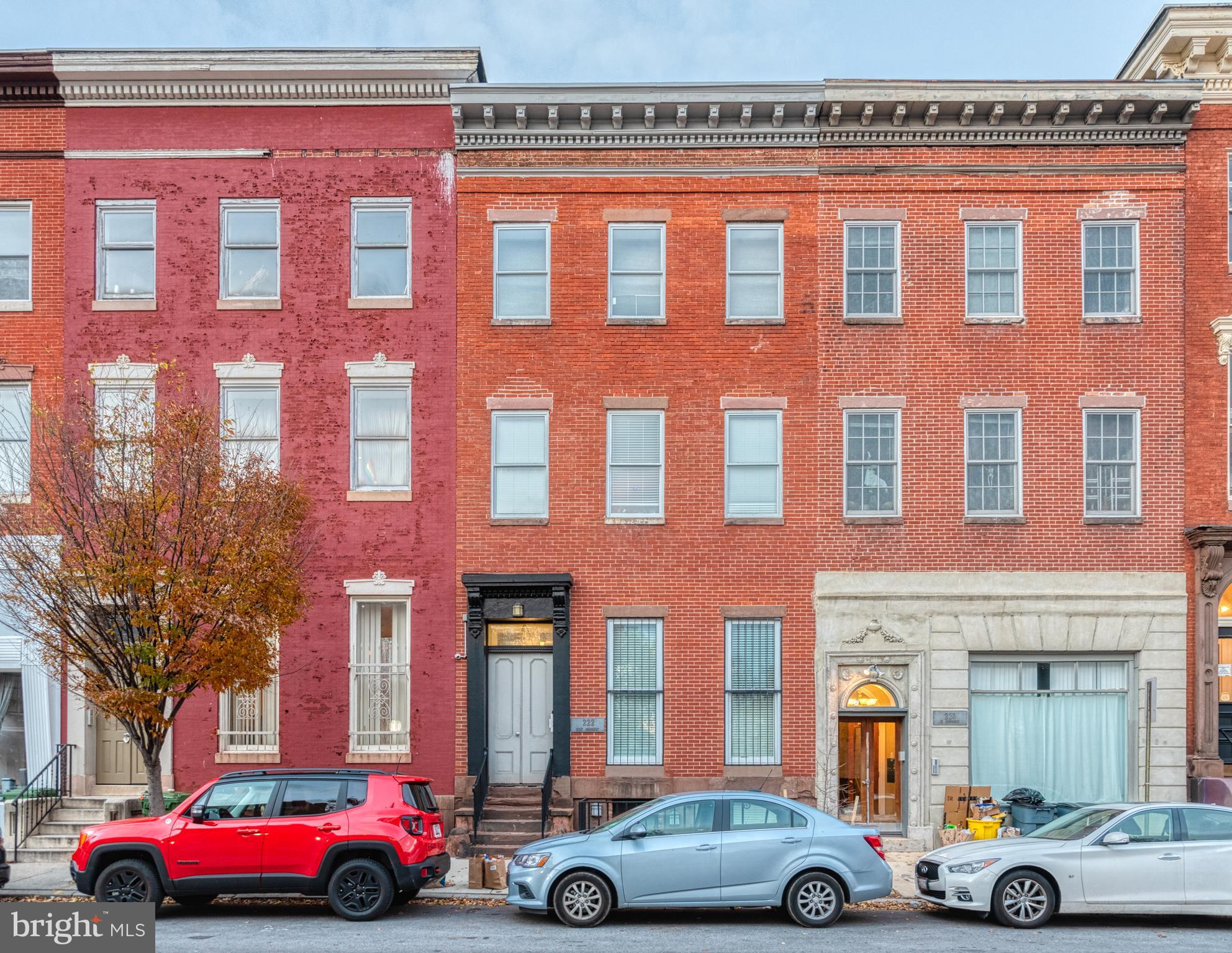 a cars parked in front of a building