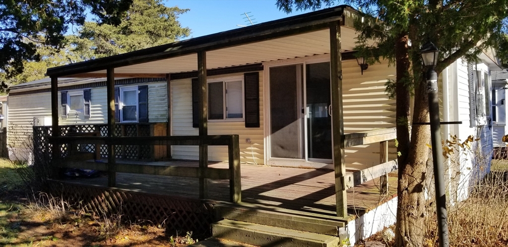 front view of a house with a small yard