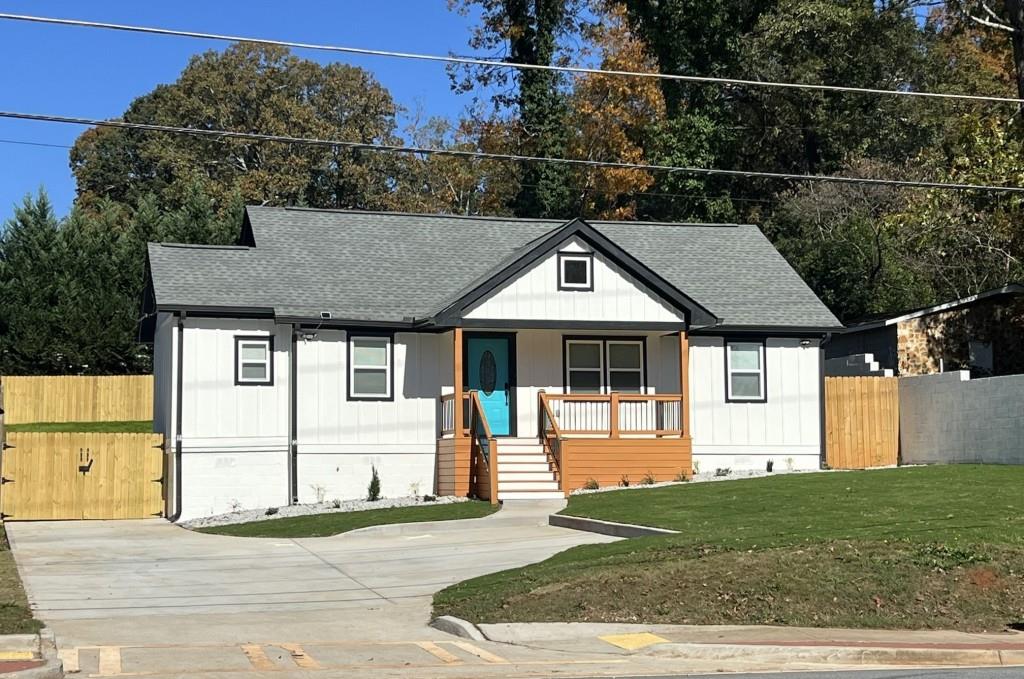 a front view of a house with a yard