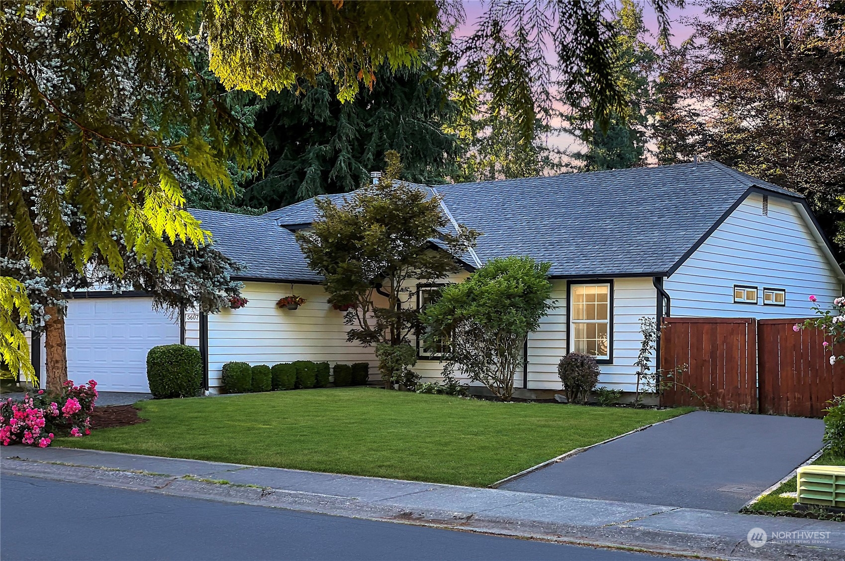 a view of a house with a garden