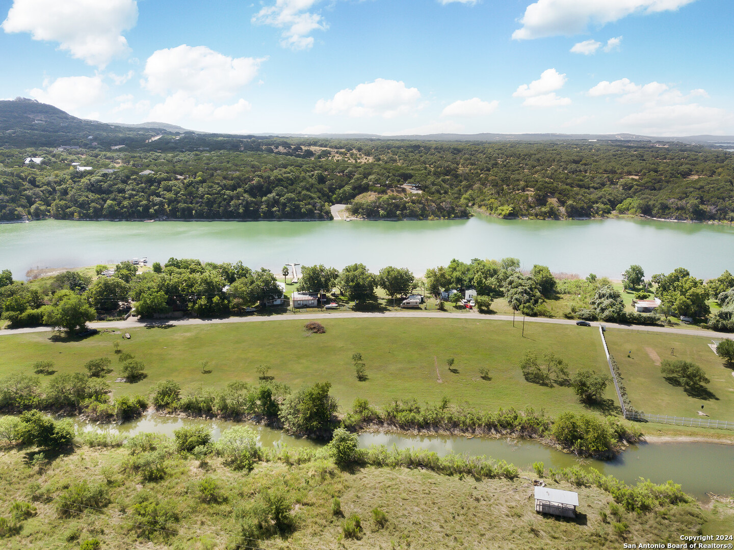 a view of a lake with a city