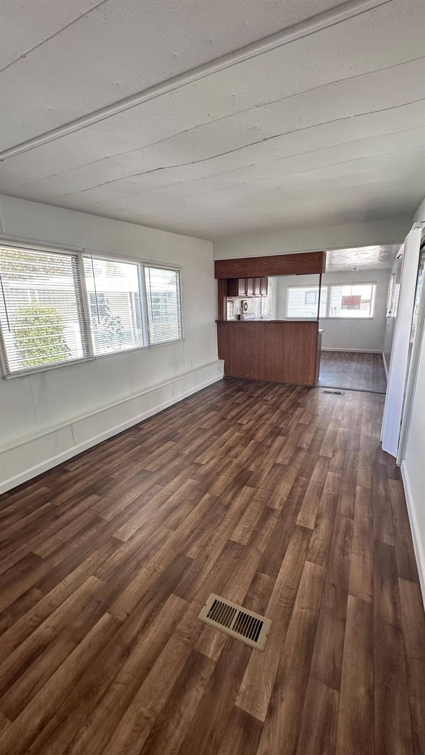 a view of an empty room and window