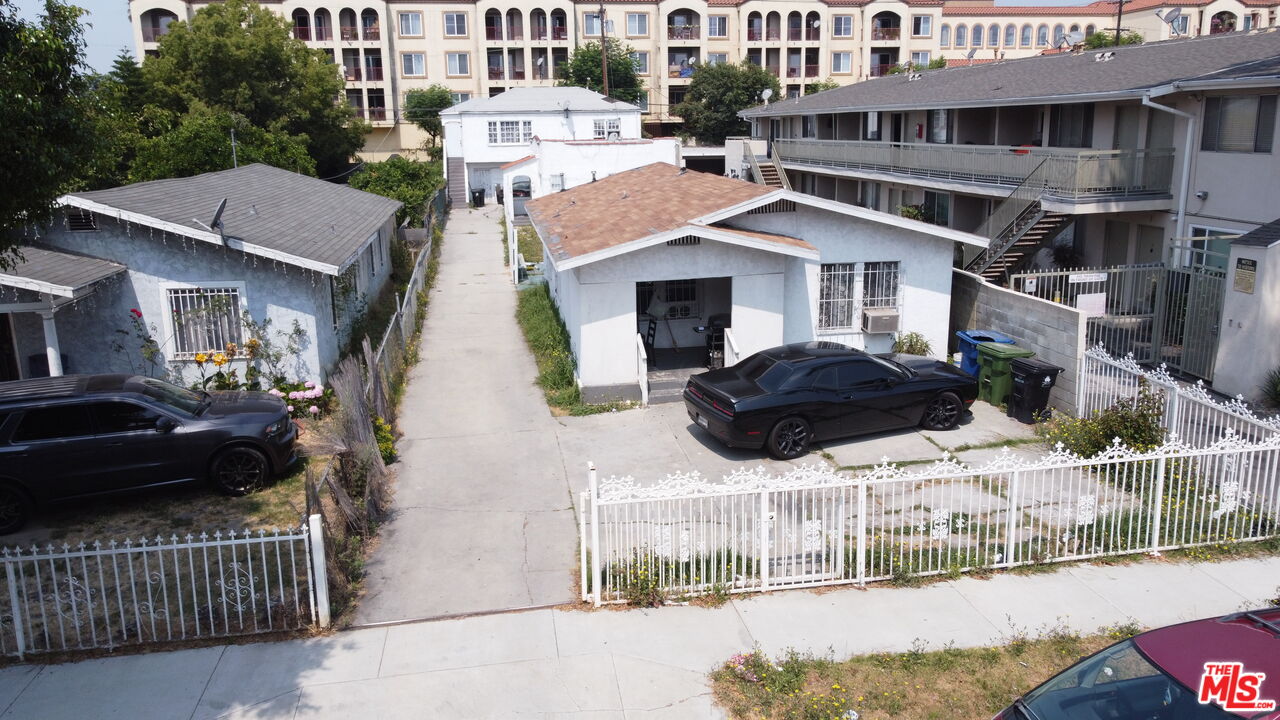 a aerial view of a house with a yard