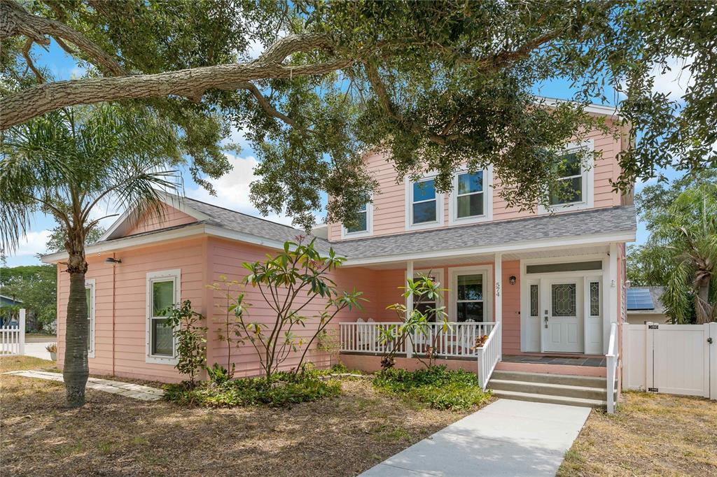 front view of a house with a yard