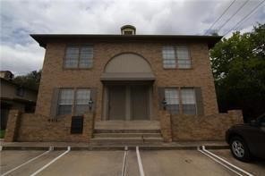 a front view of a house with garage