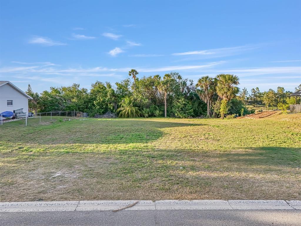 a view of a lake with a big yard