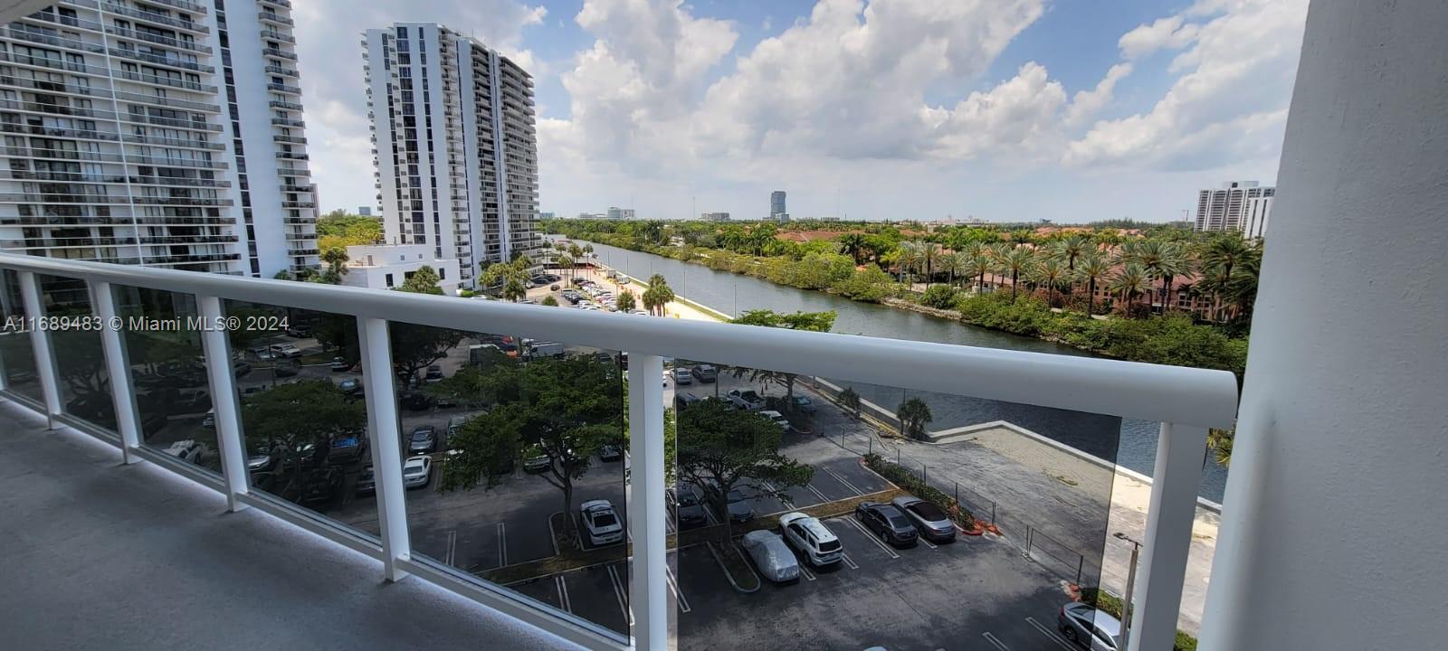 a view of balcony with furniture