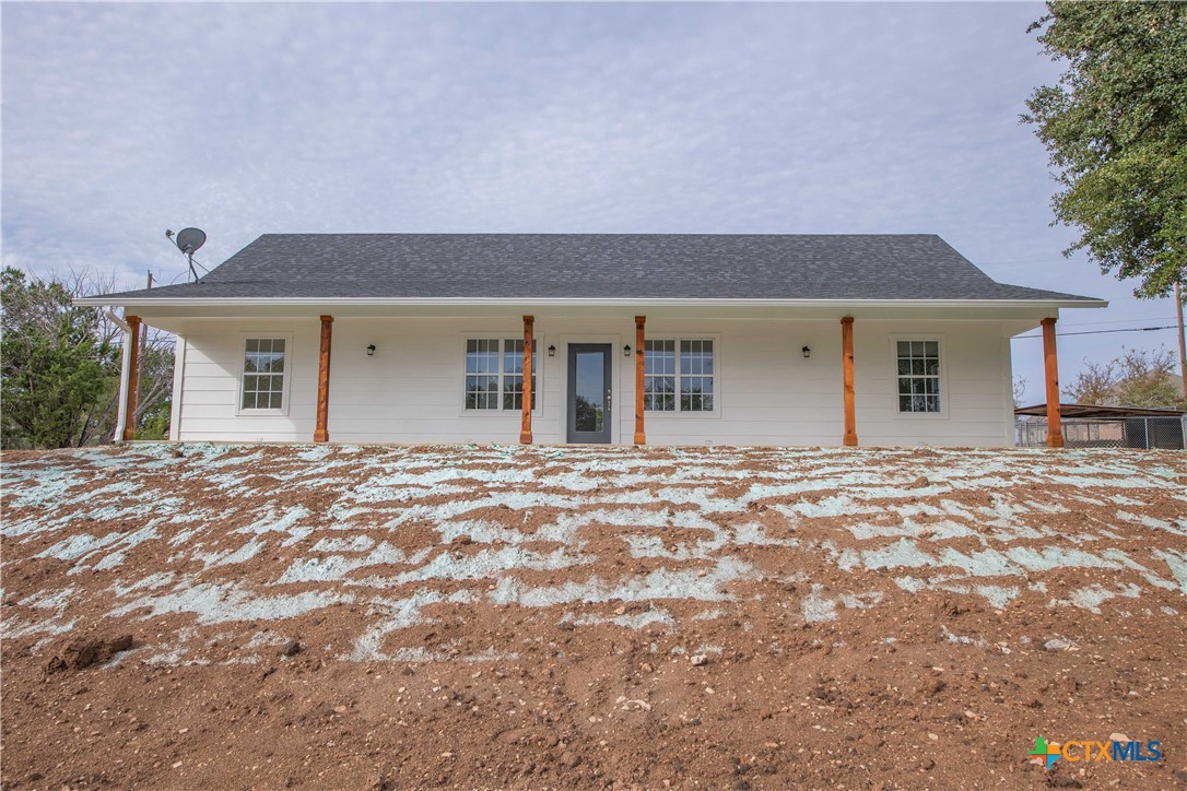 front view of house with a yard