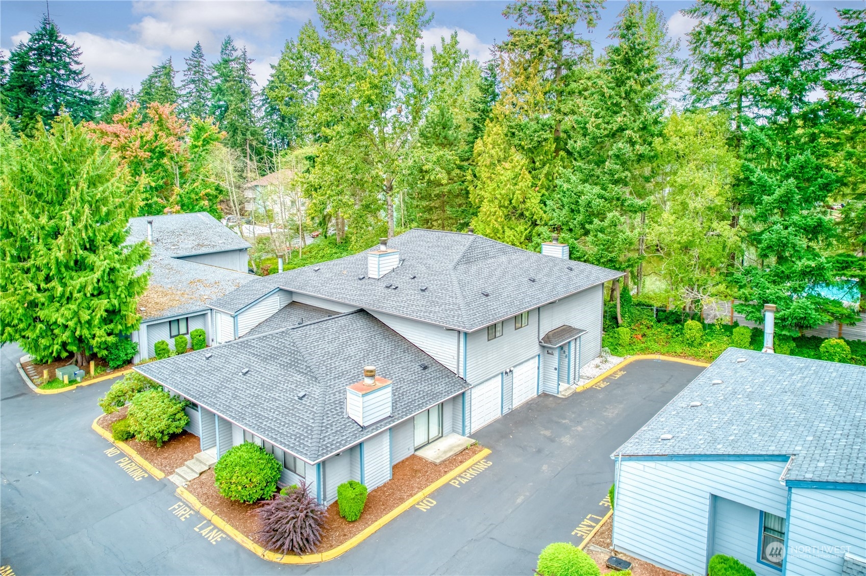 an aerial view of a house with a garden and plants