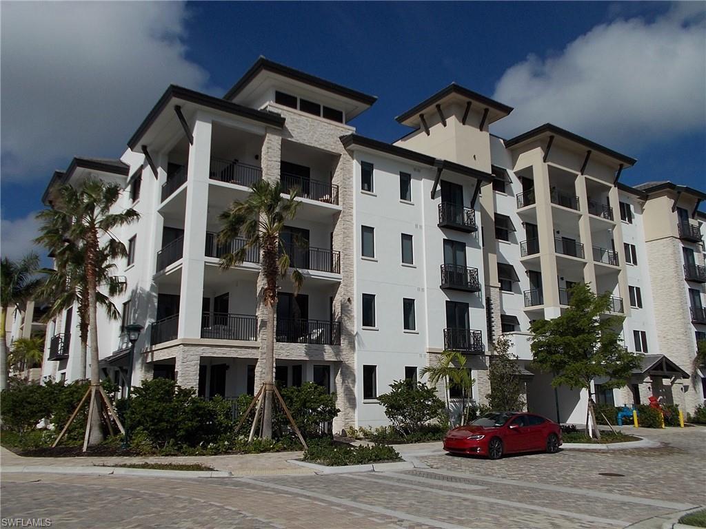 a front view of a building with street view