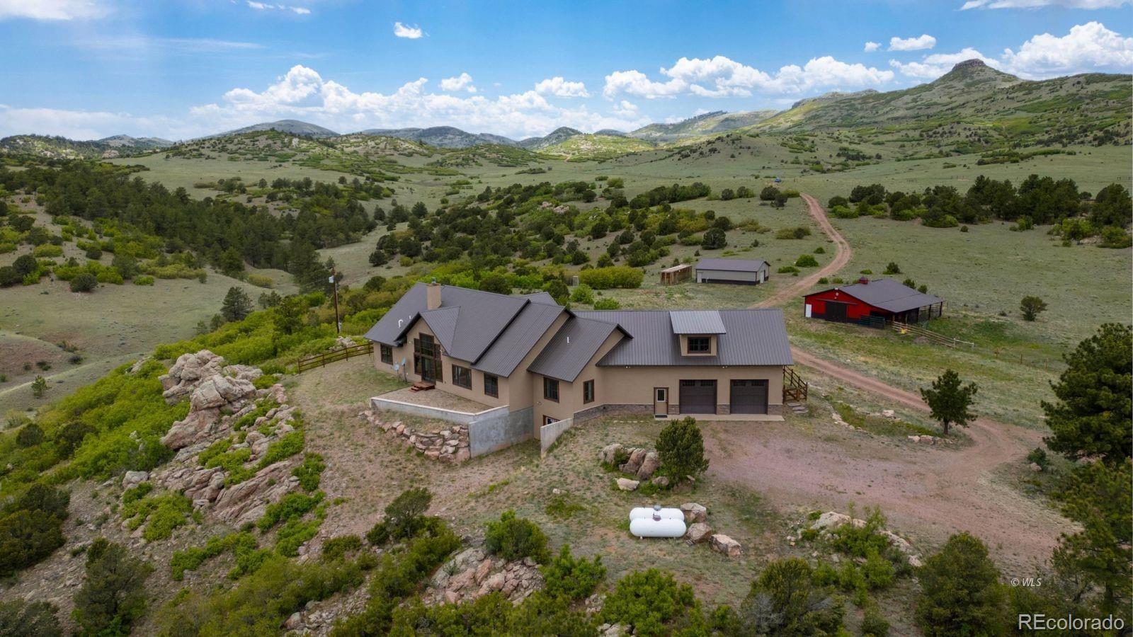 an aerial view of a house with a garden