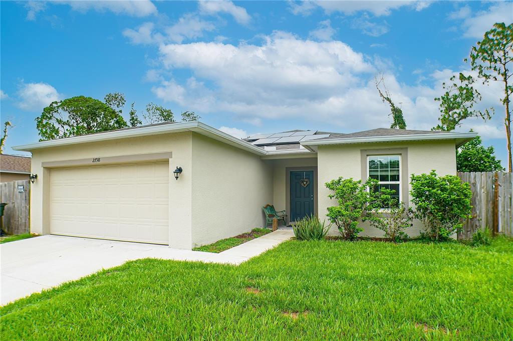 front view of house with a yard