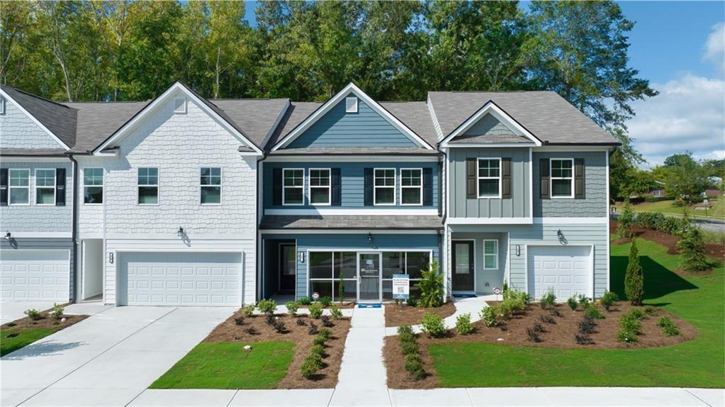 front view of a house with a yard