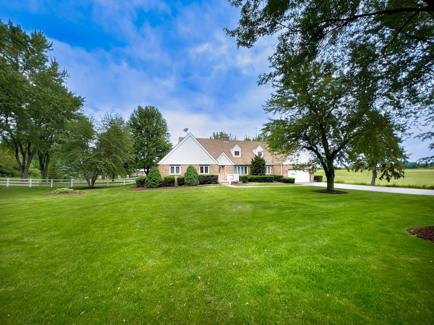 a view of a house with a big yard