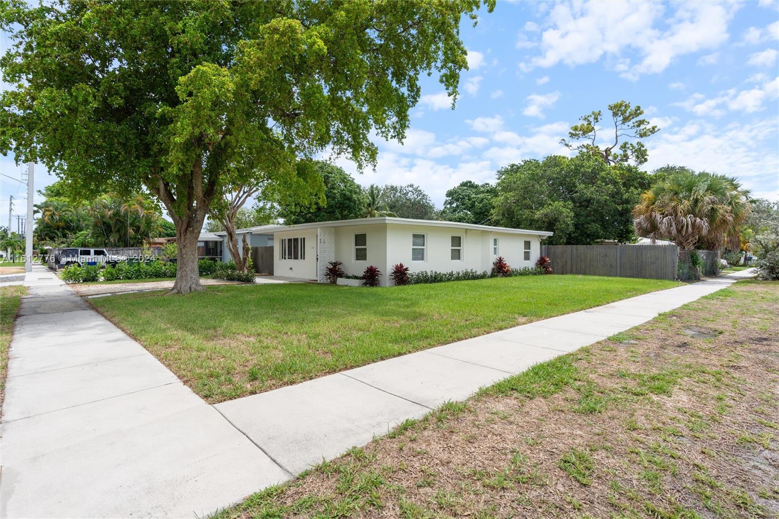 a front view of house with yard