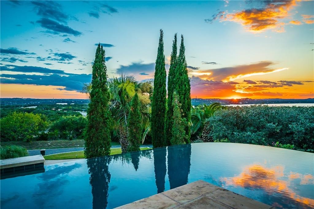 a view of a lake with a yard