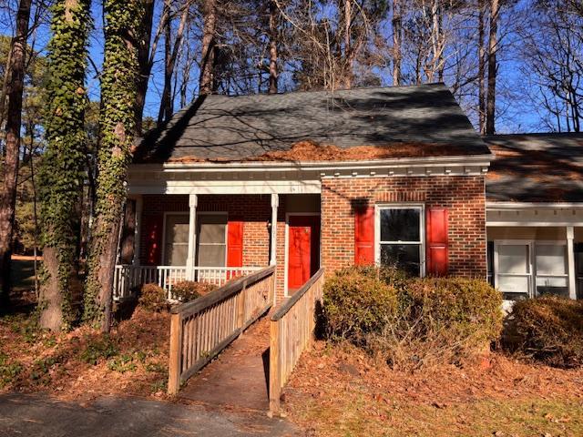 front view of a house with a small yard