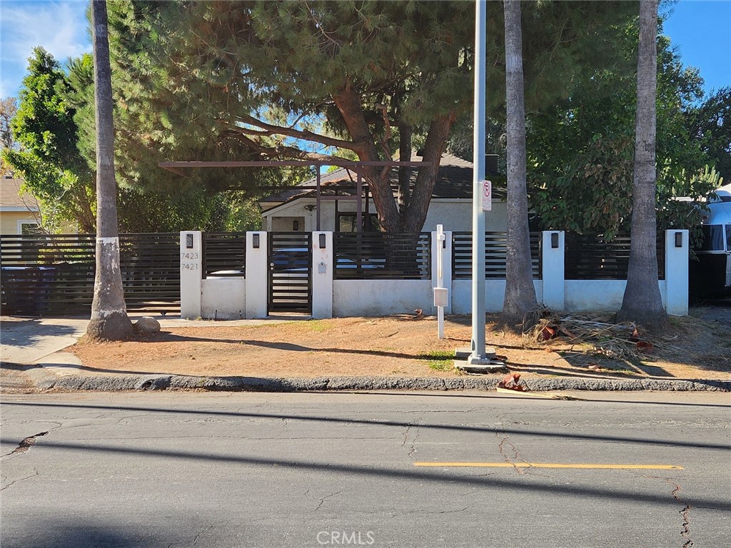 a house with trees in front of it