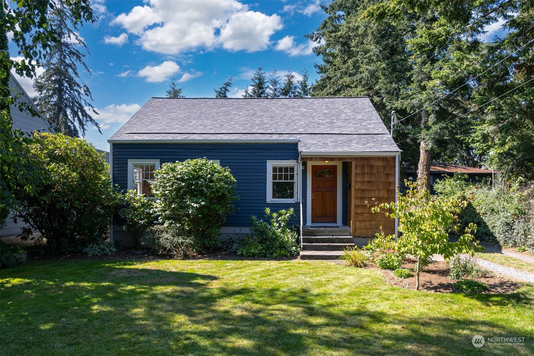 a house view with a garden space