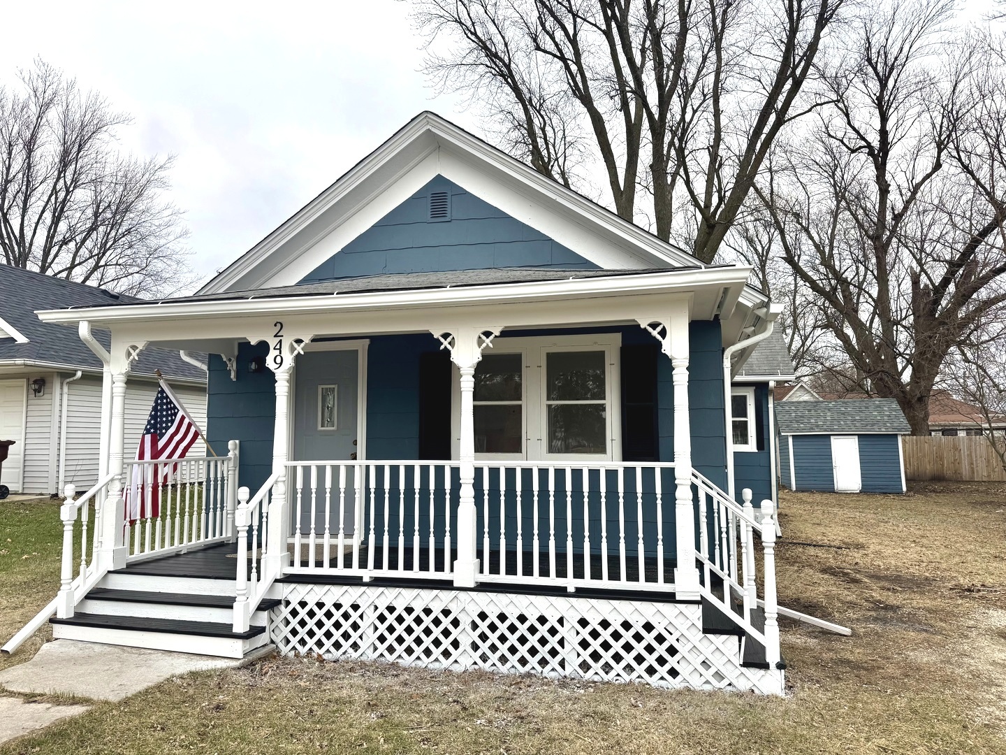 a view of a house with a bench