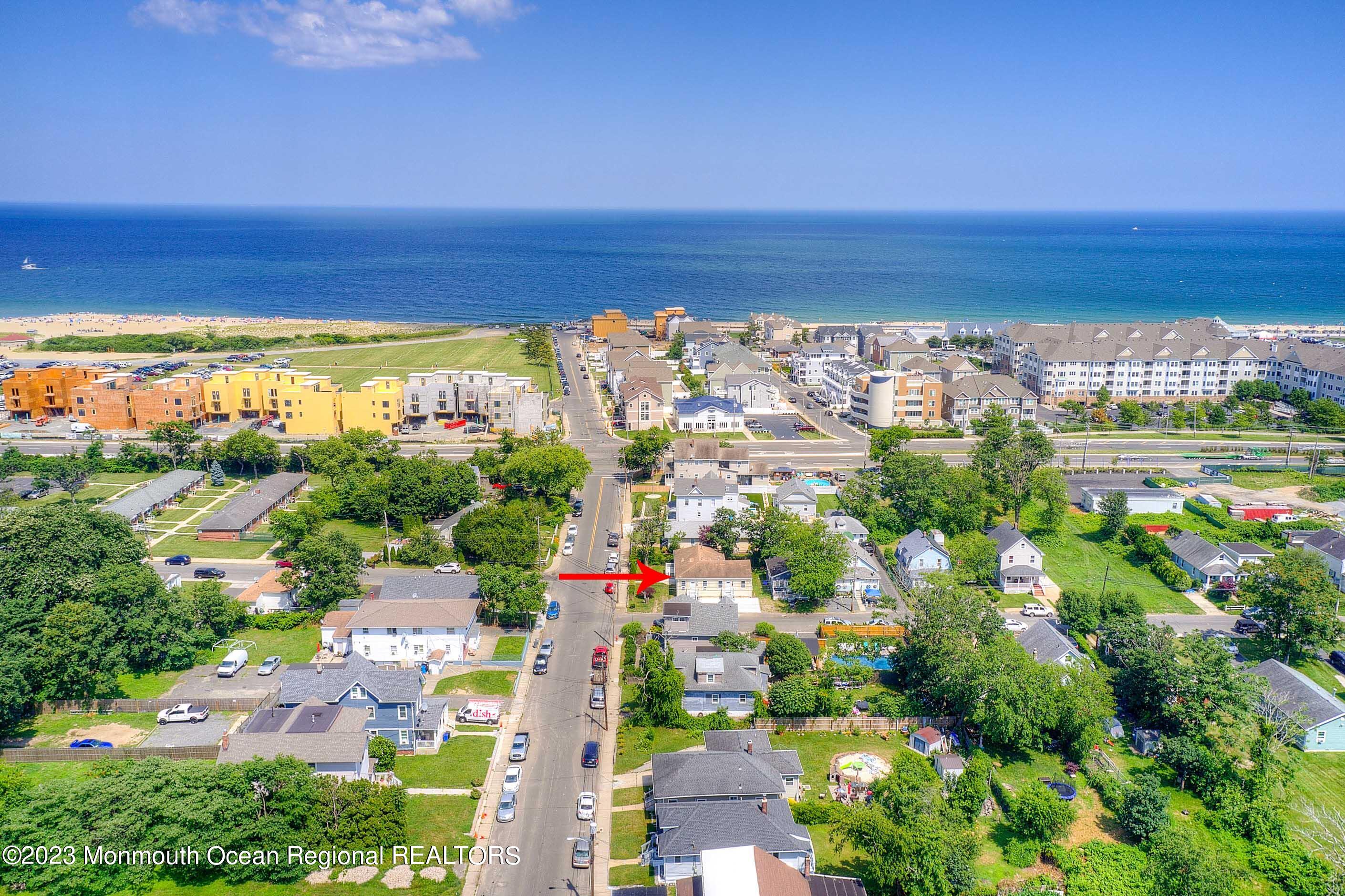 a view of a city with an ocean