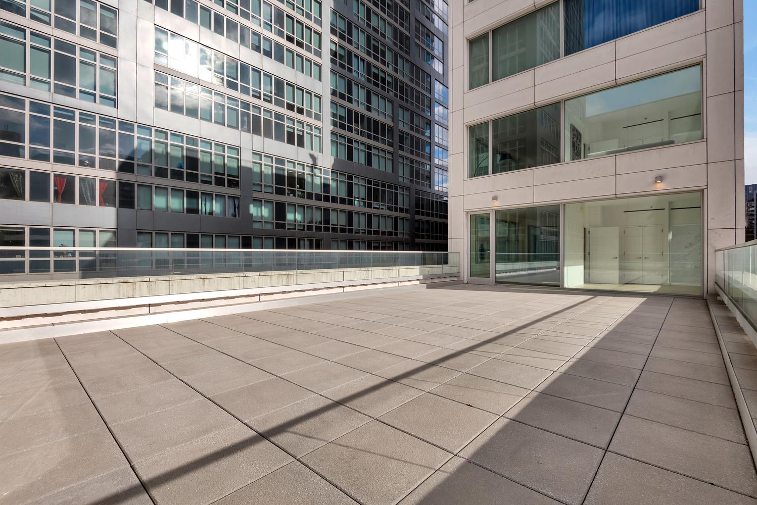 a view of a building with a glass door