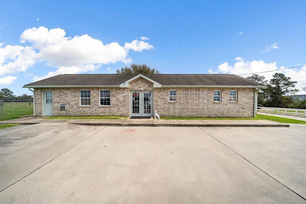 front view of a house with a swimming pool