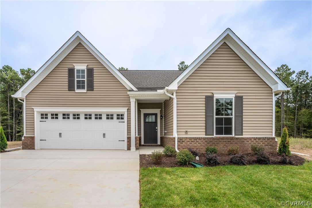 a view of house with yard and entertaining space