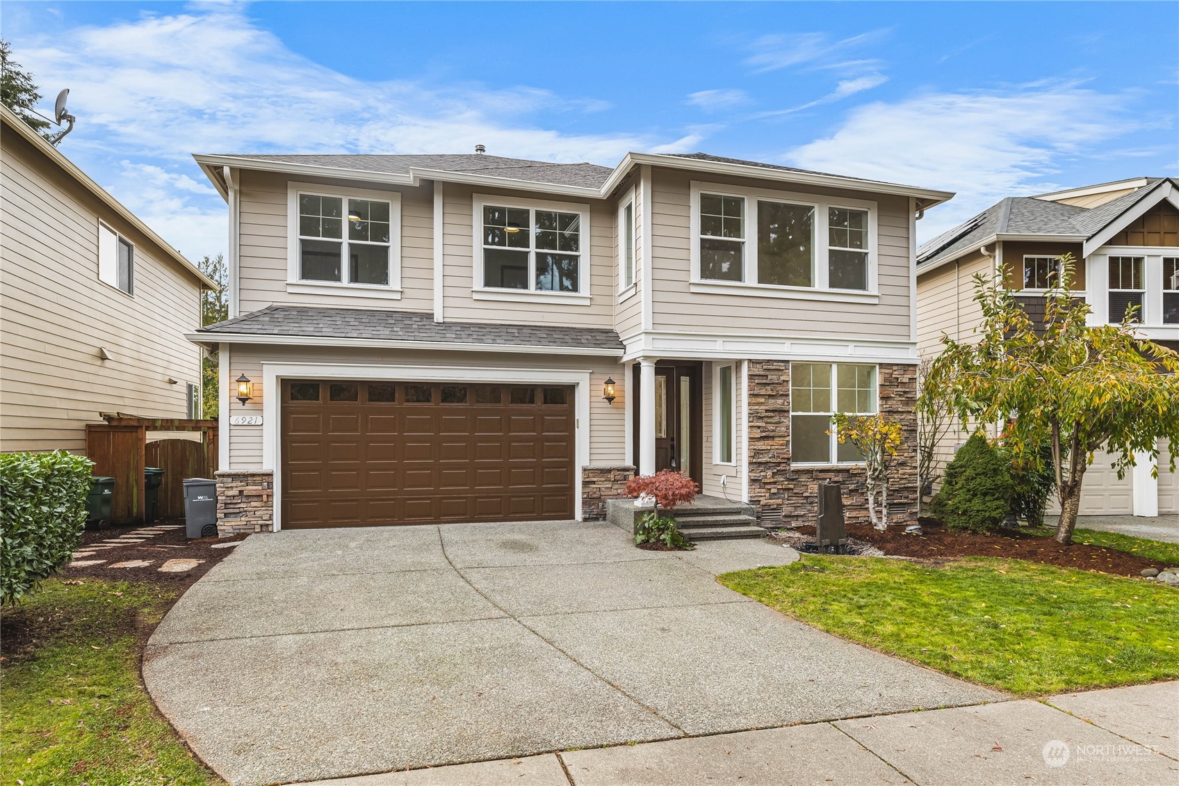 a front view of a house with yard