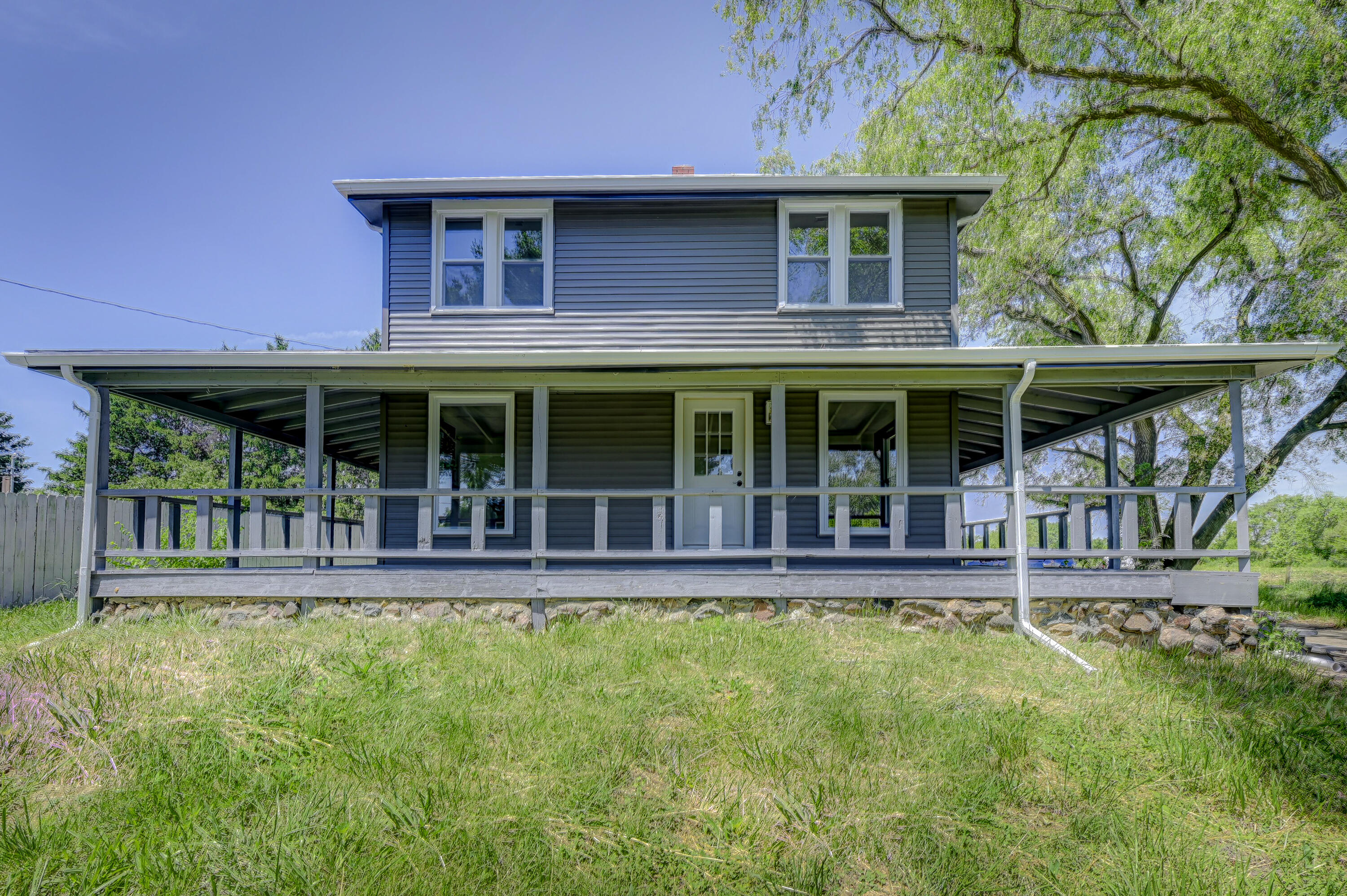 a house view with a garden space